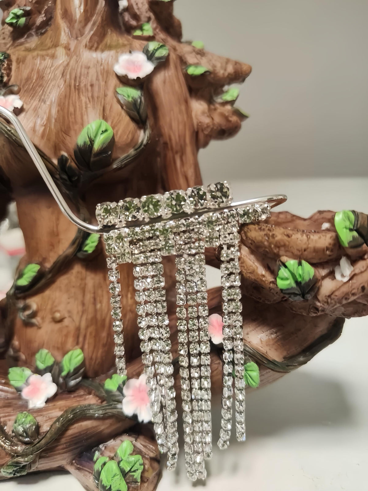 Detailed craftsmanship of the Gold & Silver Rhinestone Fringe Eyewear Masquerade Mask