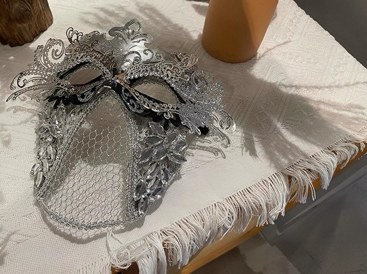 Silver Crystal Masquerade Mask displayed as wearable art