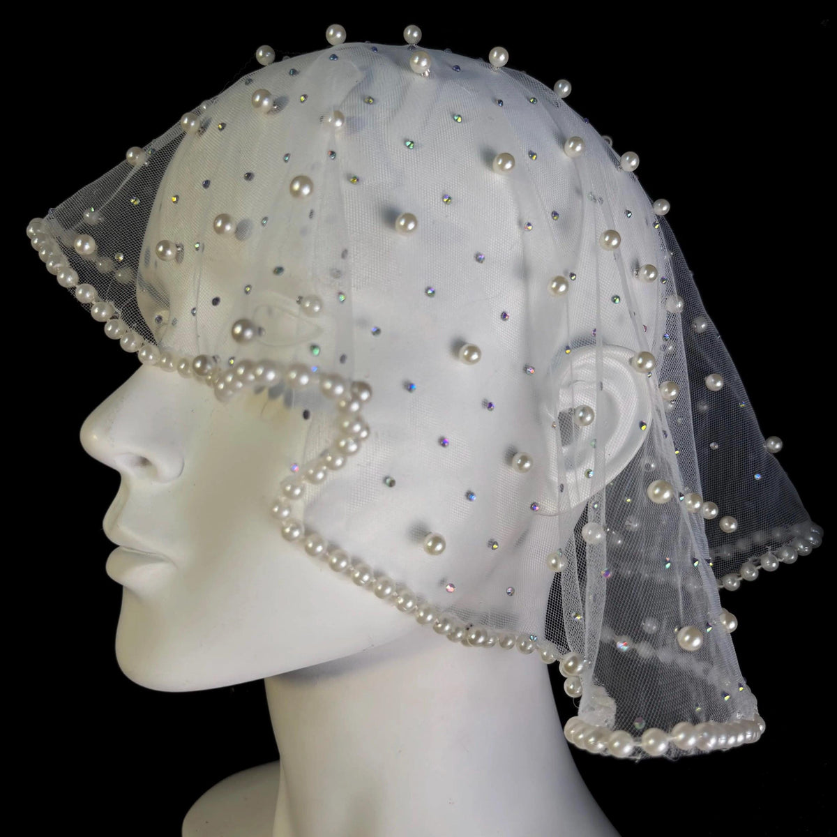 White Short Pearl Bridal Veil displayed as wearable art