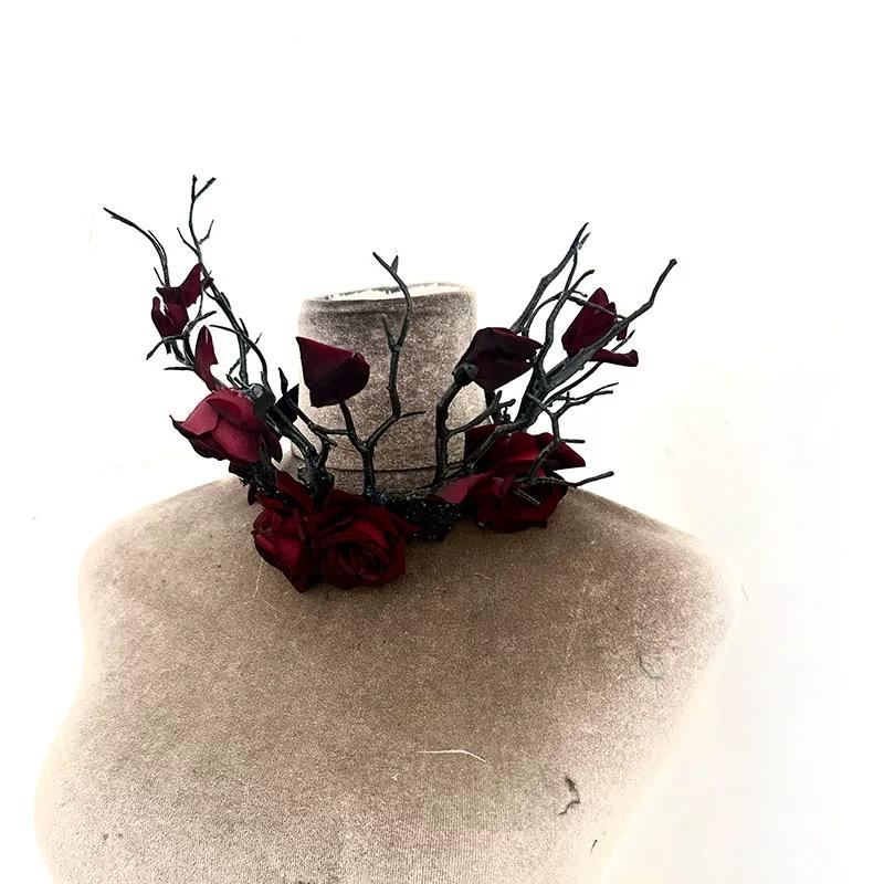 Detailed view of the handmade Black & Red Antler Branch Butterflies Roses Crown