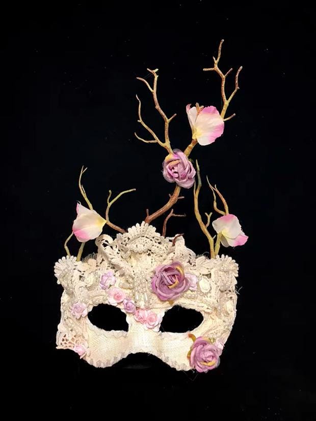 Detailed view of the handmade Ivory Romantic Floral Vertical Branch Details Masquerade Mask