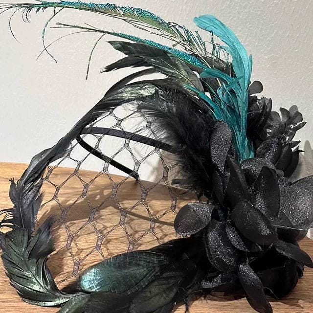 Black & Emerald Fishnet Bridal Veil displayed as wearable art