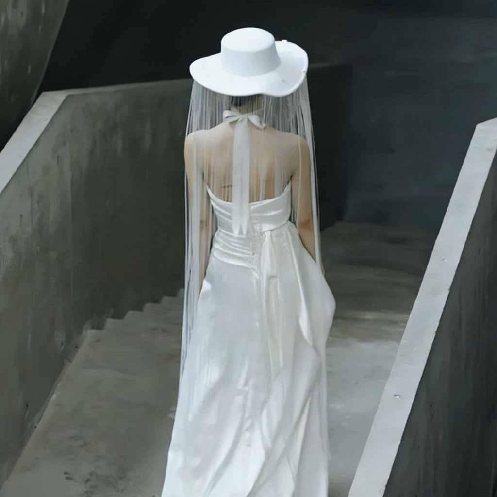 Additional handmade details of the White Long Fringe Pearl Studs Hat