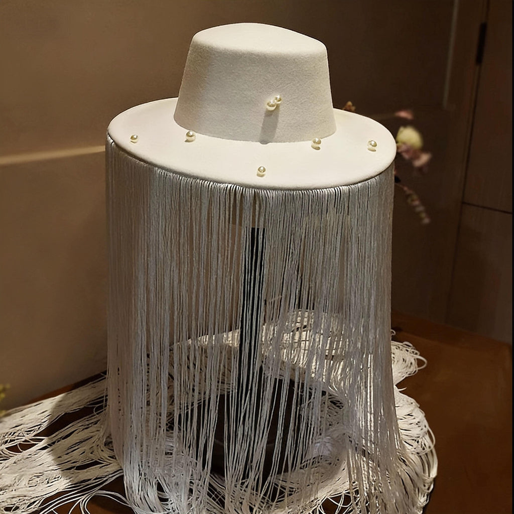 Detailed craftsmanship of the White Long Fringe Pearl Studs Hat