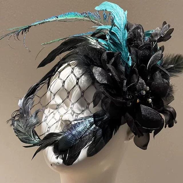 Detailed view of the handmade Black & Emerald Fishnet Bridal Veil