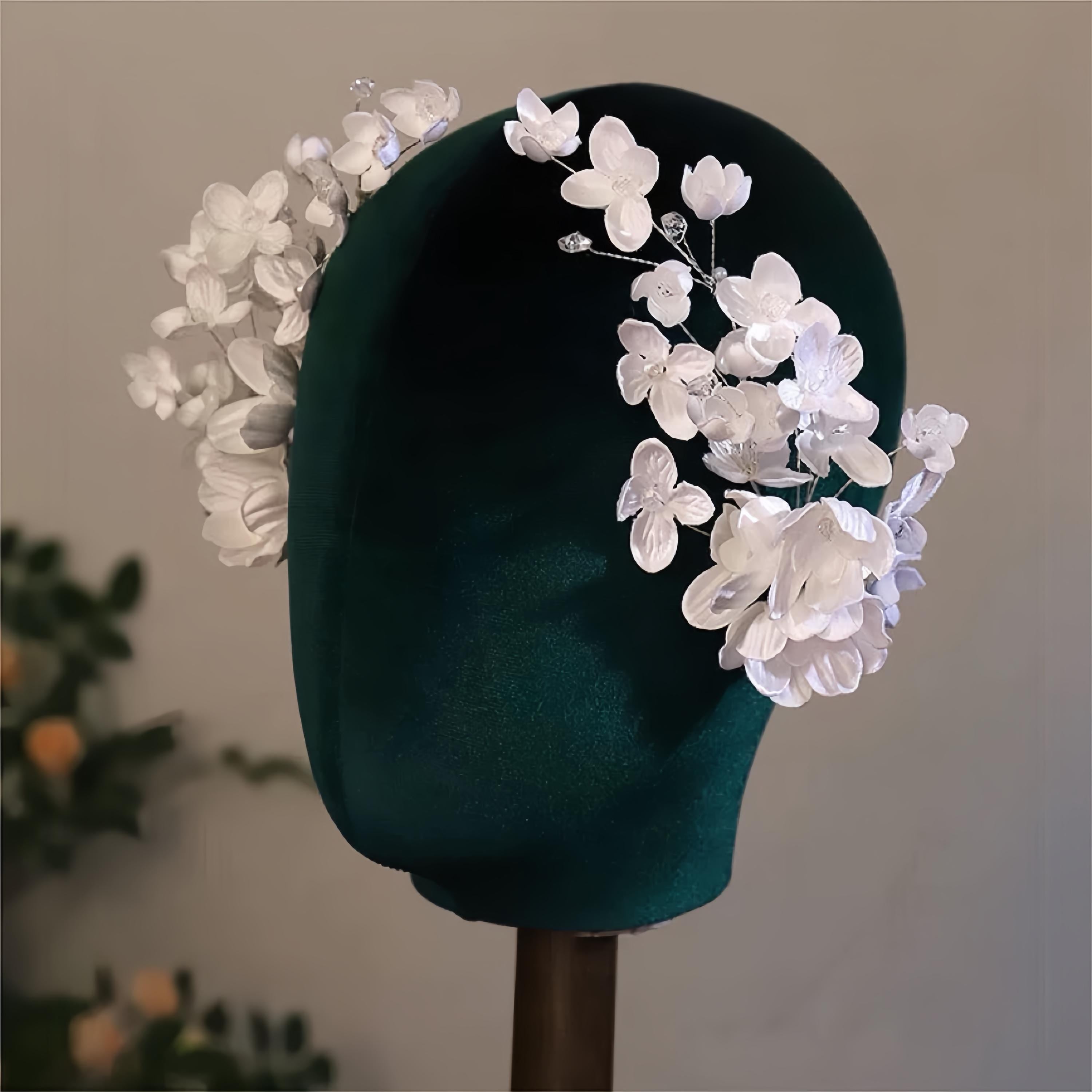 White Flower Set Hair Clip displayed as wearable art