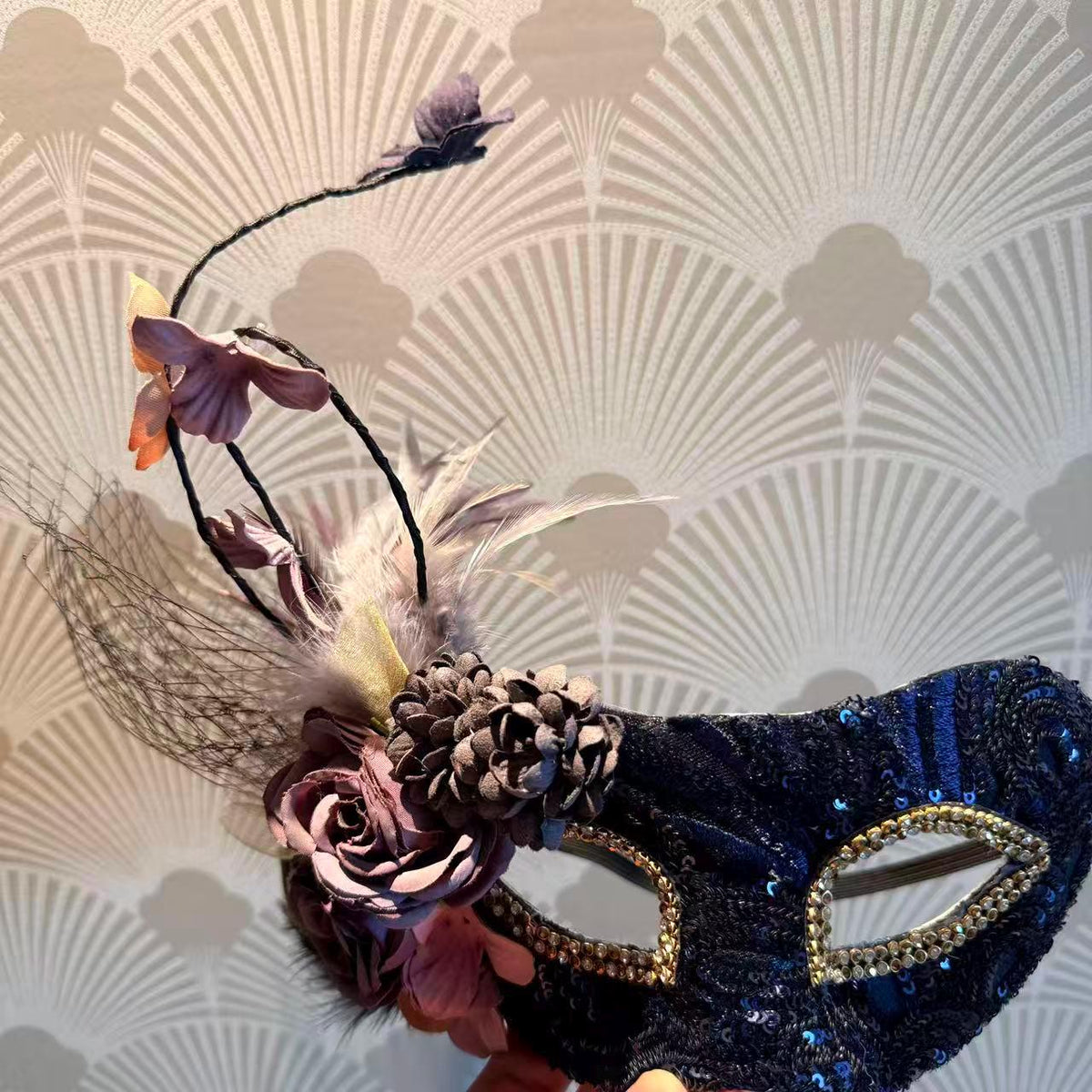 Detailed view of the handmade Purple Floral Feathers Masquerade Mask