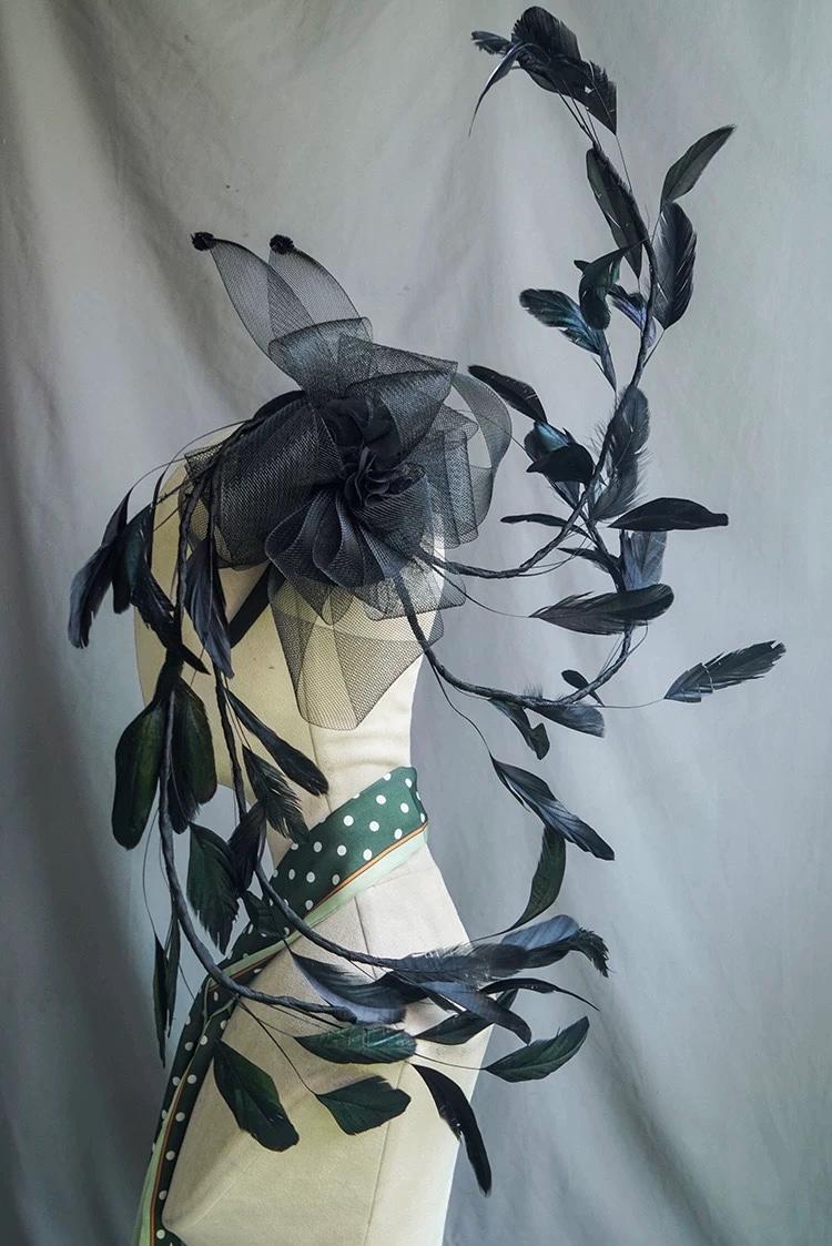 Detailed view of the handmade Black Feather Sculptural Gothic Fascinator