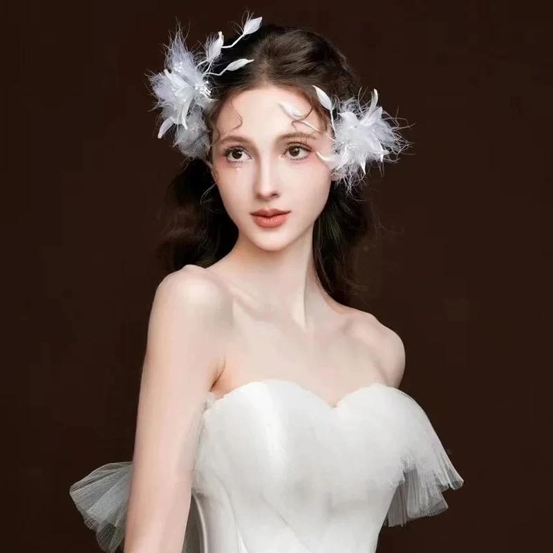 White Feather Flower Pair Vintage Ethereal Hair Clip showing its carefully made details