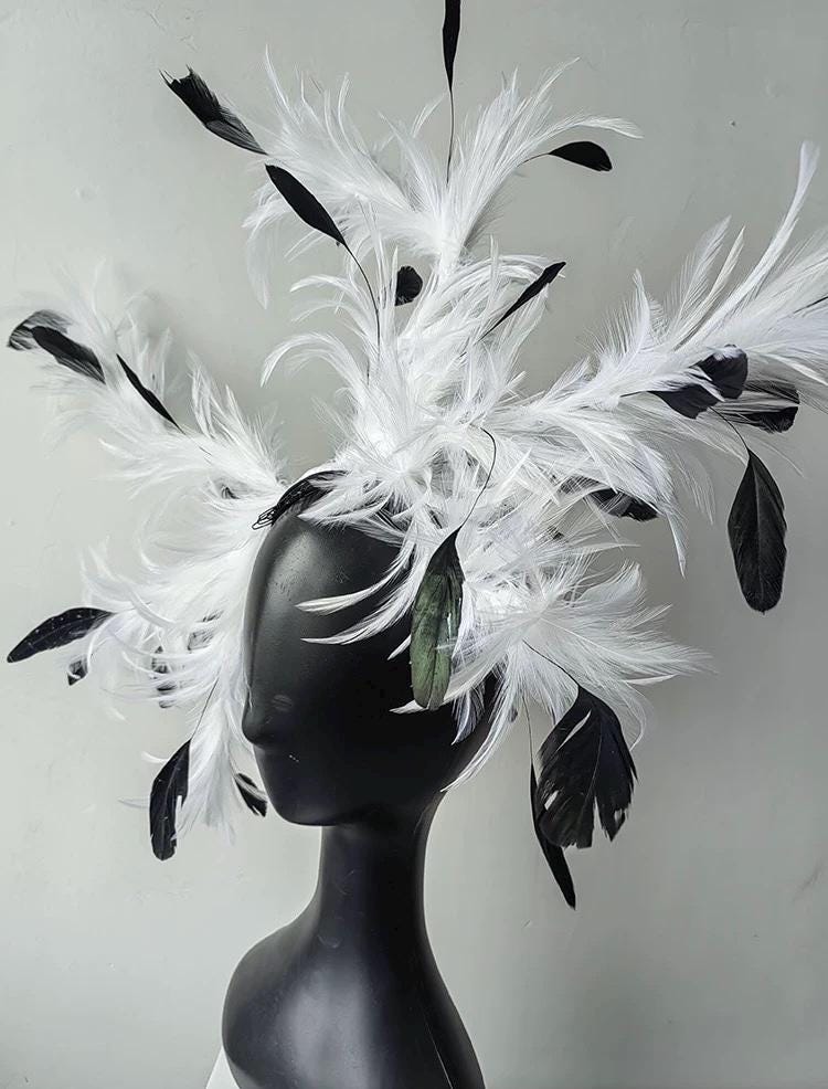 Detailed craftsmanship of the Black & White Feather Gothic Swan Fascinator