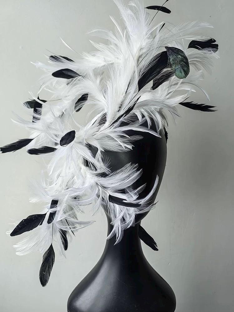 Black & White Feather Gothic Swan Fascinator displayed as wearable art