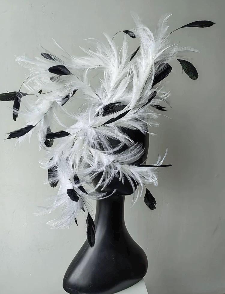 Detailed view of the handmade Black & White Feather Gothic Swan Fascinator