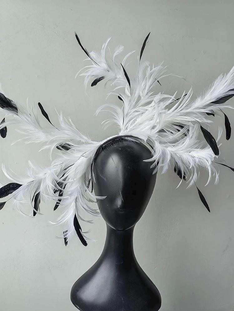 Artistic design details of the Black & White Feather Gothic Swan Fascinator