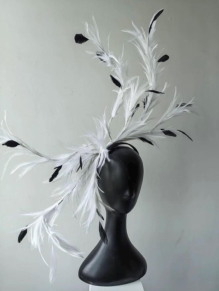 Additional handmade details of the Black & White Feather Gothic Swan Fascinator