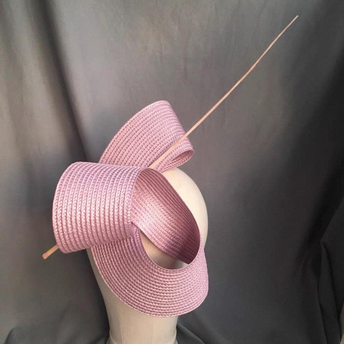 Artistic design details of the Sculptural Sinamay Cocktail Hat