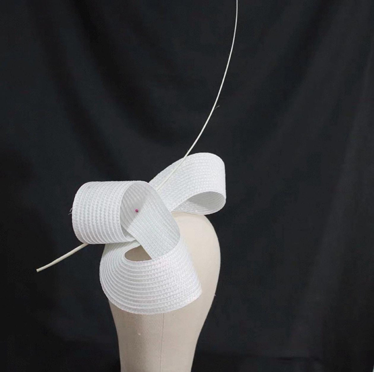 Handcrafted Sculptural Sinamay Cocktail Hat showing its handmade design