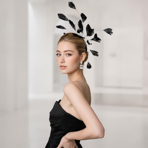 Handcrafted Black Avant Garde Feather Fascinator with feather, veil
