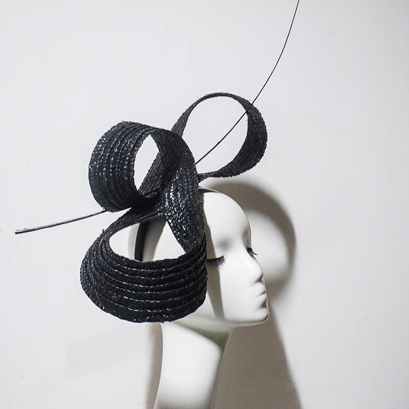 Detailed view of the handmade Sculptural Sinamay Cocktail Hat
