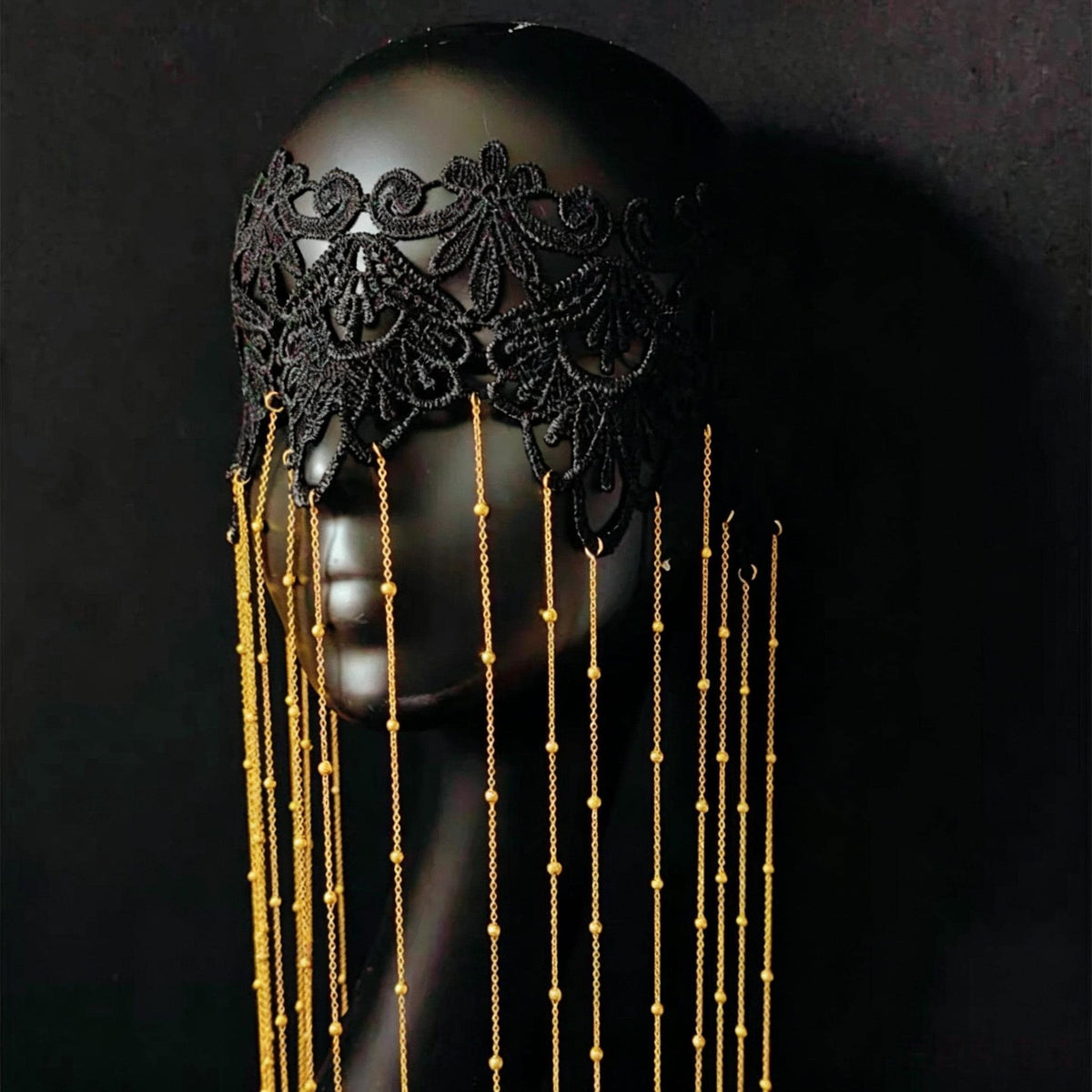Black & Gold Lace Tassels Masquerade Mask showing its carefully made details